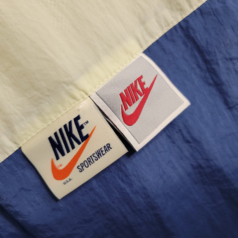 Jaqueta Corta Vento Nike 23/24 - Bege e Azul (Importação)