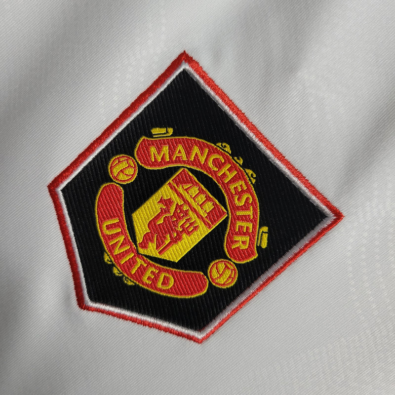 Camisa Manchester United Reserva 22/23 - Versão Feminina (Importação)